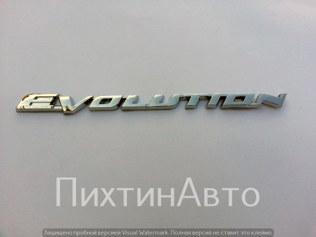 5989 IDV Шильдик на багажник "EVOLUTION" хром пластик 5989